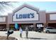 Exterior view of a Lowe's home improvement store featuring a pickup service and seasonal sales at 6009 Swanston Dr, Charlotte, NC 28269