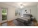 Comfortable bedroom with exterior access and backyard views at 6016 Gray Gate Ln # C, Charlotte, NC 28210