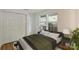 Bedroom with large closet and bright natural light at 6016 Gray Gate Ln # C, Charlotte, NC 28210