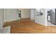 Spacious living room with fireplace opening up to a modern kitchen with stainless steel appliances at 6016 Gray Gate Ln # C, Charlotte, NC 28210