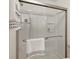Modern glass shower with shelves, and towel rack at 6016 Gray Gate Ln # C, Charlotte, NC 28210