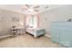 Comfortable bedroom offers a cheerful atmosphere with a bright color scheme and a spacious layout at 6202 Pumpernickel Ln, Wesley Chapel, NC 28110