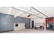 Well-organized garage with ample storage cabinets and a convenient workspace at 6202 Pumpernickel Ln, Wesley Chapel, NC 28110