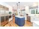 Modern kitchen with stainless steel appliances and custom cabinetry, seamlessly blending style and utility at 6202 Pumpernickel Ln, Wesley Chapel, NC 28110