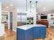 Open concept kitchen with a large island, modern appliances, and ample counter space, great for cooking and entertaining at 6202 Pumpernickel Ln, Wesley Chapel, NC 28110