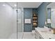 Stylist bathroom featuring a glass shower, designer vanity with a marble countertop and gold fixtures at 6208 Rocky Falls Rd, Charlotte, NC 28211