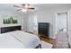 Bright bedroom with two dressers and easy access to a walk-in closet and ensuite bathroom at 6208 Rocky Falls Rd, Charlotte, NC 28211