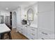 Kitchen nook area featuring a bar sink and built-in shelving for an espresso machine at 6208 Rocky Falls Rd, Charlotte, NC 28211