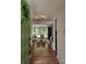 Inviting entryway with wood floors leading into a bright living room at 7228 Rollingridge Dr, Charlotte, NC 28211