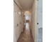Bright hallway features carpet floor with coat closet and leads into a dining room with seating at 7228 Rollingridge Dr, Charlotte, NC 28211