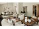 Bright and airy living space with modern decor and an adjacent dining area at 7228 Rollingridge Dr, Charlotte, NC 28211