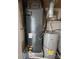 Utility closet features modern water heater and HVAC system in updated mechanicals area at 7228 Rollingridge Dr, Charlotte, NC 28211