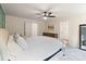 Spacious bedroom featuring a comfortable bed, ample natural light, and a view into the en suite bathroom at 7308 Rothmore St, Charlotte, NC 28215