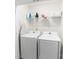 Laundry area includes modern appliances and practical storage solutions at 7308 Rothmore St, Charlotte, NC 28215