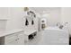 Convenient mudroom with built-in storage and a laundry area at 7683 Sarah Dr, Denver, NC 28037