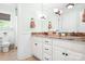 Elegant bathroom with double vanity, granite countertops, and modern fixtures at 7738 Burning Ridge Dr, Stanley, NC 28164