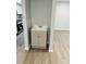 Bathroom vanity features a neutral cabinet with a white countertop and modern faucet at 8029 Cedar Glen Dr, Charlotte, NC 28212