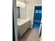 Well-lit bathroom with double vanity sinks and granite countertops at 8029 Cedar Glen Dr, Charlotte, NC 28212