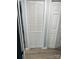 Hallway with bifold closet door and neutral paint at 8029 Cedar Glen Dr, Charlotte, NC 28212