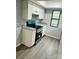 Modern kitchen with sleek appliances, granite countertops, and ample cabinet space at 8029 Cedar Glen Dr, Charlotte, NC 28212