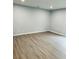 Spacious living room showcases sleek flooring, neutral walls and recessed lighting at 8029 Cedar Glen Dr, Charlotte, NC 28212