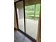 Exterior patio features a serene landscape, greenery, and a sliding glass door entrance at 8029 Cedar Glen Dr, Charlotte, NC 28212