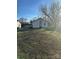 The backyard features a lot of open grass and a shed at 843 Spring St, Rock Hill, SC 29730