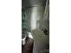 Compact bathroom featuring a vanity, toilet, and shower/tub combination with curtain at 843 Spring St, Rock Hill, SC 29730