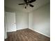 A serene bedroom is complete with ceiling fan, closet, and laminate flooring at 843 Spring St, Rock Hill, SC 29730