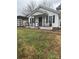 Charming single-story home featuring a quaint front porch and well-maintained lawn at 843 Spring St, Rock Hill, SC 29730