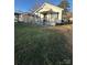 A single story home with an inviting front porch and beautiful landscaping at 843 Spring St, Rock Hill, SC 29730