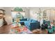 Bright living room with vaulted ceiling, large window, and a comfortable blue sectional sofa at 8605 Tamarron Dr, Charlotte, NC 28277