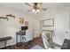 Inviting office space with a ceiling fan, desk, and neutral decor at 8605 Tamarron Dr, Charlotte, NC 28277