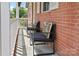 Cozy front porch features two cushioned chairs with decorative pillows for relaxing outdoor seating at 906 Eastwood Dr, Rock Hill, SC 29730