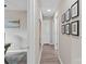 Well-lit hallway with modern decor and neutral walls leading to various rooms in the home at 906 Eastwood Dr, Rock Hill, SC 29730