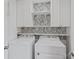 Functional laundry room with washer, dryer, and decorative wallpaper at 906 Eastwood Dr, Rock Hill, SC 29730