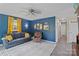 Cozy living room with natural light, decor, and gray wood flooring at 906 Eastwood Dr, Rock Hill, SC 29730