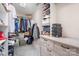 Well-organized walk-in closet with shelving, hanging rods, drawers, and ample storage space for clothes and accessories at 915 Waterview Ln, Monroe, NC 28110
