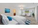 This main bedroom features a lovely chandelier and is adjacent to the main bath and walk in closet at 9230 Loch Glen Way, Charlotte, NC 28278
