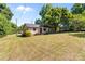Cozy home with a well-manicured lawn and mature trees in a serene setting at 94 Sumner Nw Ave, Concord, NC 28027