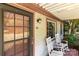 Charming front porch with seating, offering a cozy spot to relax and enjoy the neighborhood view at 94 Sumner Nw Ave, Concord, NC 28027