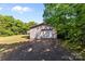 Spacious detached garage with driveway, providing ample parking and storage space at 94 Sumner Nw Ave, Concord, NC 28027
