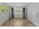 The laundry room features a washer, dryer, windows, and a door at 94 Sumner Nw Ave, Concord, NC 28027