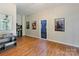 Spacious bonus room with wood floors, neutral walls, and ample space for recreation and relaxation at 9433 Wallace Pond Dr, Huntersville, NC 28078
