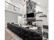 Bright living room with stone fireplace and vaulted ceiling at 9712 Worley Dr, Charlotte, NC 28215
