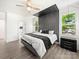 Serene main bedroom featuring sleek modern design and large windows with nature views at 9712 Worley Dr, Charlotte, NC 28215