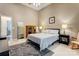 Comfortable bedroom with a queen-sized bed, neutral decor, and bright natural light at 1066 Iveywood Nw Pl, Concord, NC 28027