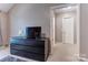 Spacious bedroom with a dresser and doorway to another room at 1066 Iveywood Nw Pl, Concord, NC 28027