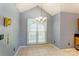 Bright dining area with natural light and chandelier, set in a cozy home at 1066 Iveywood Nw Pl, Concord, NC 28027