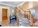 Inviting foyer with staircase, chandelier, tiled floor, and dining area view at 1066 Iveywood Nw Pl, Concord, NC 28027